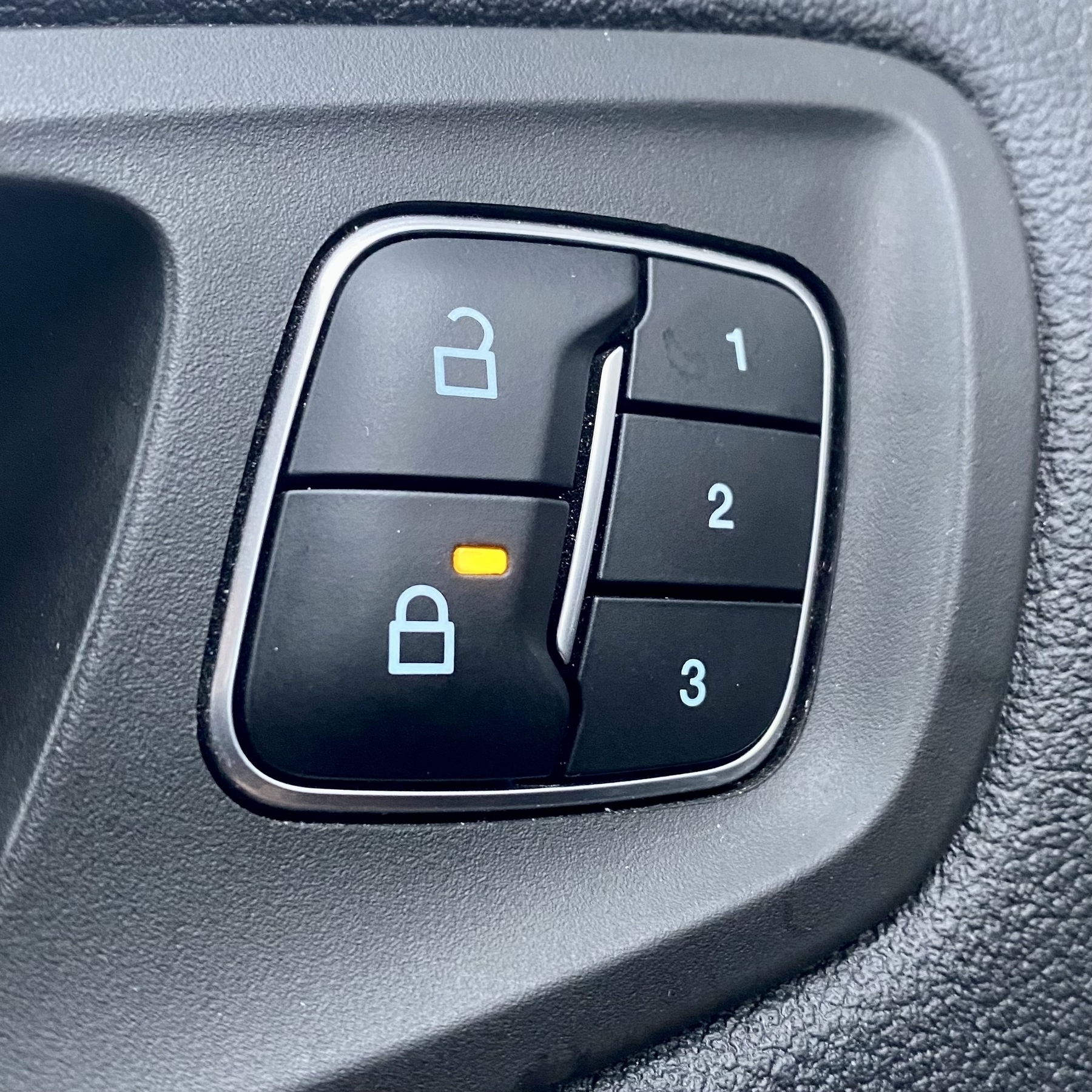 Interior car door lock buttons