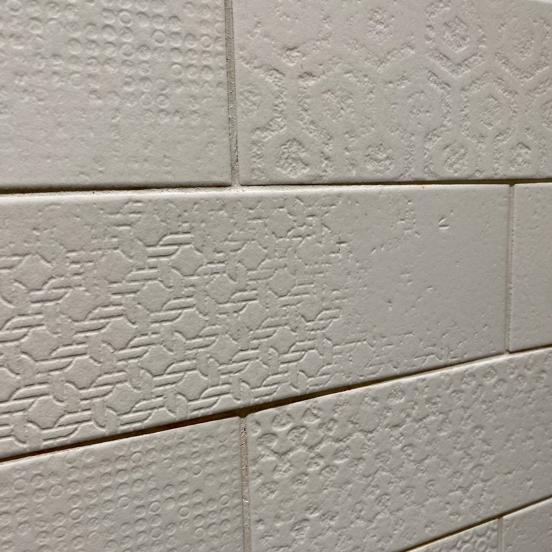 White bathroom tile with texture
